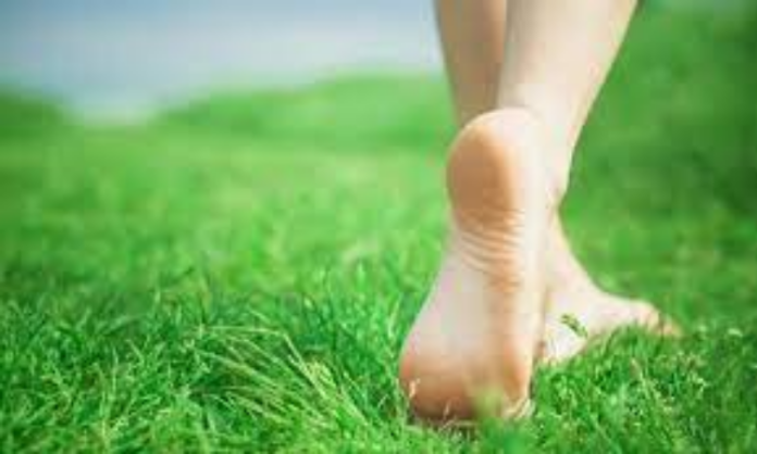 Benefits Of walking Barefoot On Grass